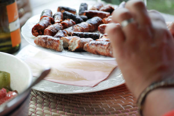 Grilled sausage Grilled sausage on a plate grillade stock pictures, royalty-free photos & images