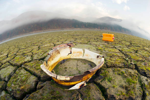 dry land of the reservoir in the Carpathian Mountains ecological desert symbolizes human life in the world of industrial revolution in countries with a low level of culture of behavior in nature