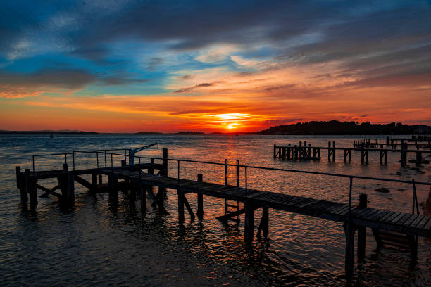 istock Sunset over the jetty at Sandbanks in Dorset 1134433413