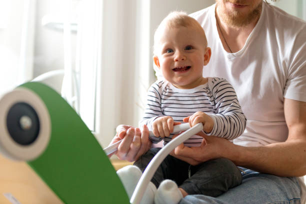 istock Smiling boy enjoying the day with his father 1134434686
