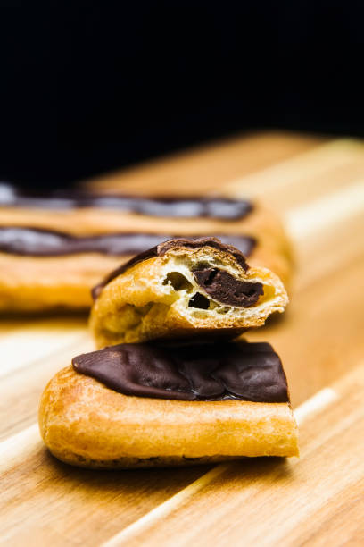 istock Eclair crispy creamy cake with dark chocolate 1134434733