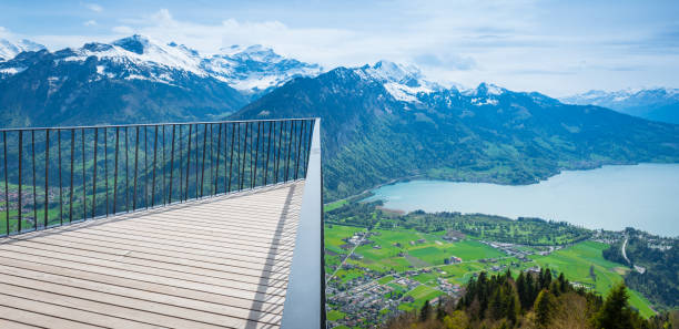views on bernese alps from viewing platform at the end of "cliffwalk" in grindelwald first - interlaken berne brienz lake imagens e fotografias de stock