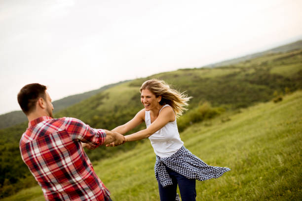 istock Loving coulpe having fun in the spring nature 1134438020