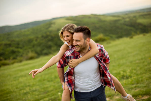 istock Loving coulpe having fun in the spring nature 1134438038