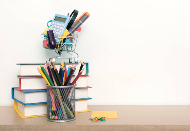 istock School supplies on wood table background. empty copy space. 1134440065