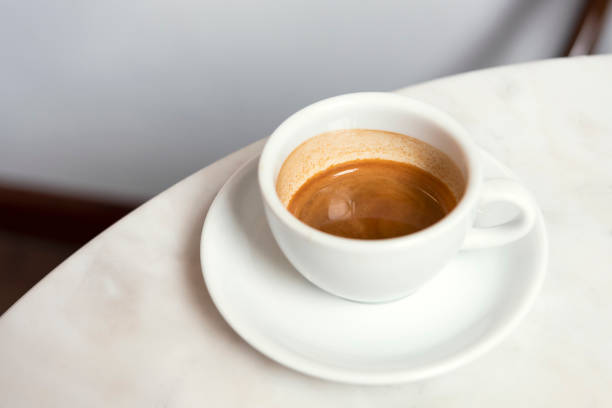 istock Espresso shot coffee ,top view on marble table in cafe. 1134440068
