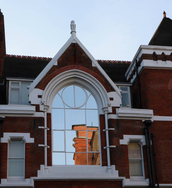 istock Chelsea house with reflections in window. 1134442815