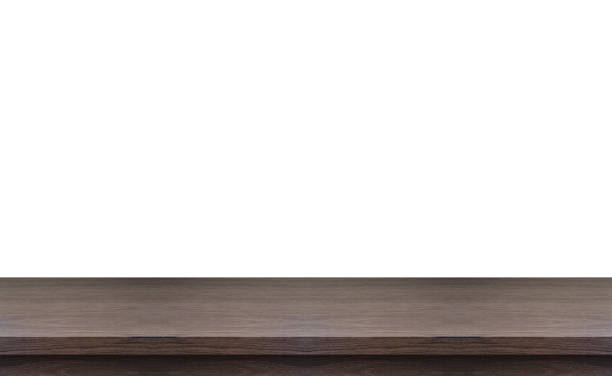 istock Empty wooden table. Wood table top and white background. 1134443316
