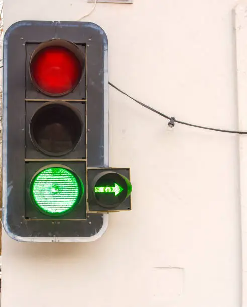 Traffic light with green light and arrow