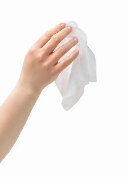 Cropped shot of an unrecognizable woman hand holding a washcloth isolated on a white background