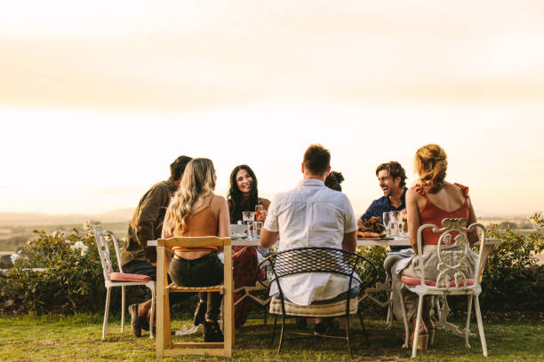 istock Group of young friends having dinner party 1134454515