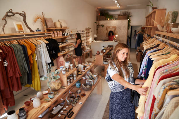 istock Customers Browsing In Independent Clothing And Gift Store 1134458292
