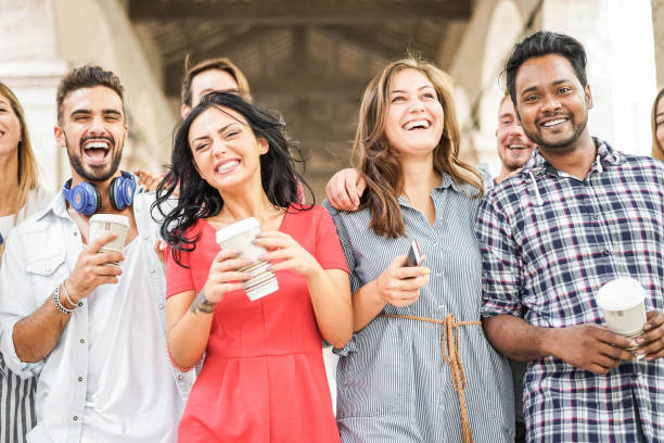 happy millennials friends having fun together - young students drinking coffee and laughing together in old town street- youth lifestyle, school and friendship concept - main focus on indian man face - day asian ethnicity asian culture asian and indian ethnicities imagens e fotografias de stock