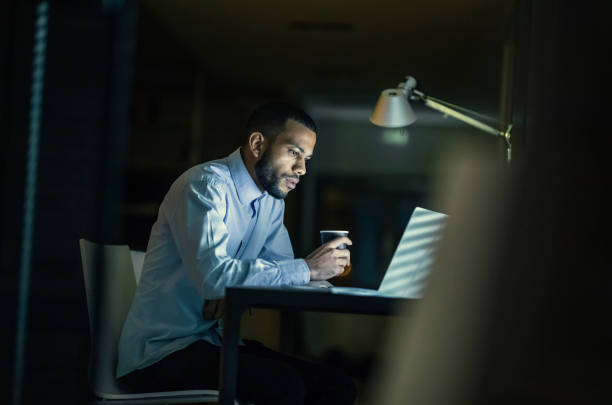 istock Overworked Businessman Working Late in The Office 1134460518