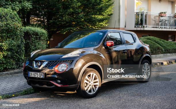 Beautiful Gray Nissan Juke Suv Car Parked Stock Photo - Download Image Now - Car, City, City Street