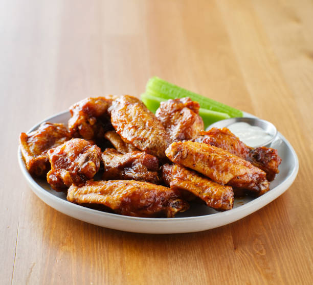 istock plate of bbq chicken wings 1134464413