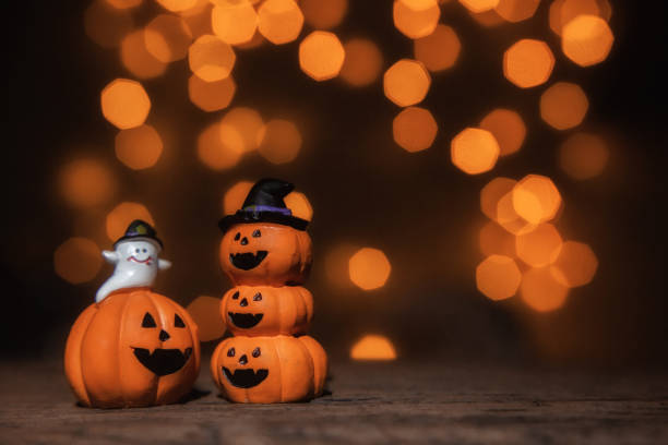 istock Halloween pumpkins and bokeh background, Halloween day concept. 1134467842