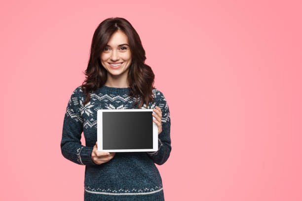 istock Lovely lady with modern tablet 1134468843