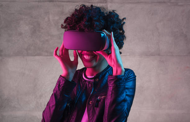 istock Cheerful black teenager wearing VR goggles 1134468906