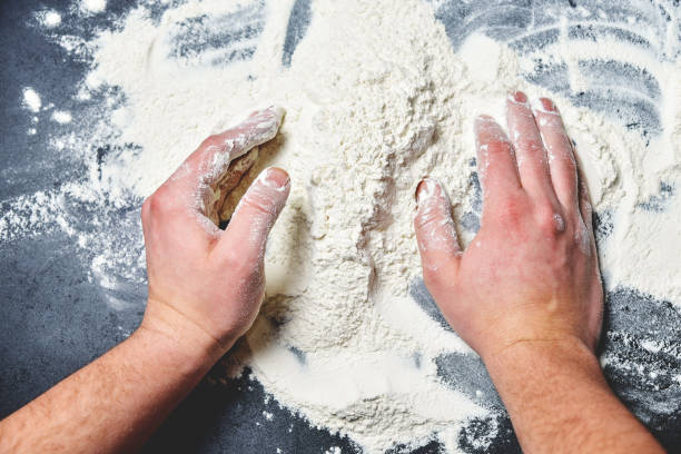 istock Prepare chef hand with flour cooking in kitchen 1134471199