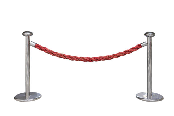 red rope Barrier with stainless steel poles isolate on white background. Portable Barrier.