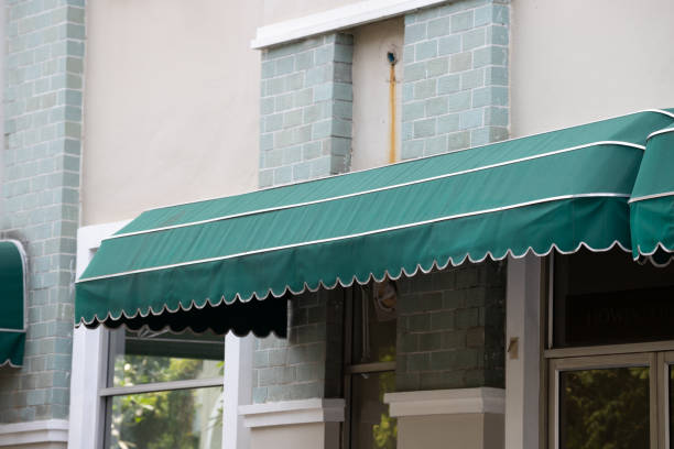 istock green curve awning over office door. green shading canvas. 1134472682