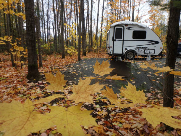 istock Camping in the Fall with Caravan Trailer, Quebec, Canada 1134472753