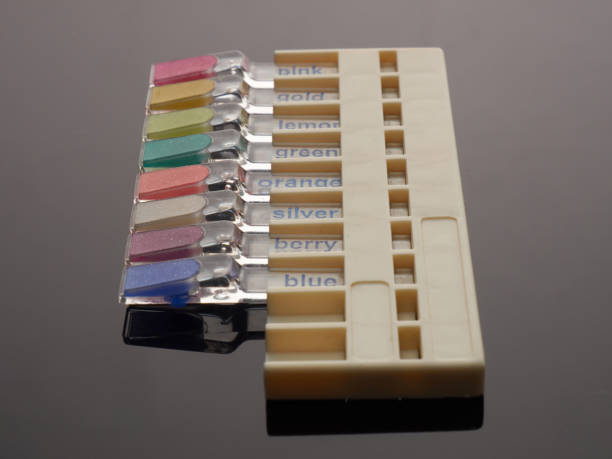 istock Medical fillings of different colors on a gray gradient background 1134472896