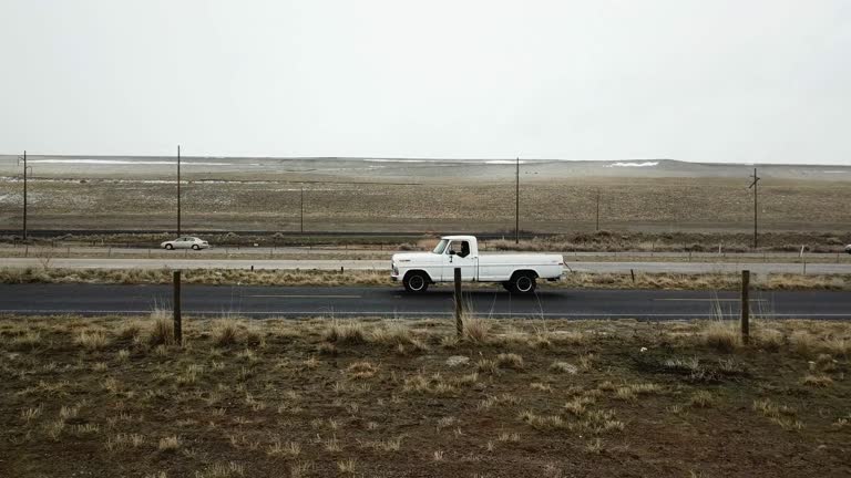 Vintage Pick up Truck Side View on an Old Highway