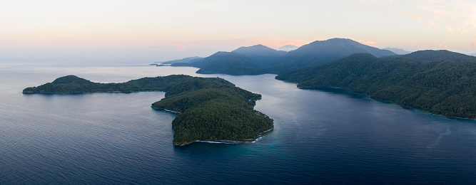 A bird's eye view of remote islands off New Ireland in Papua New Guinea. This remote area is part of the Coral Triangle due to its high marine biodiversity.