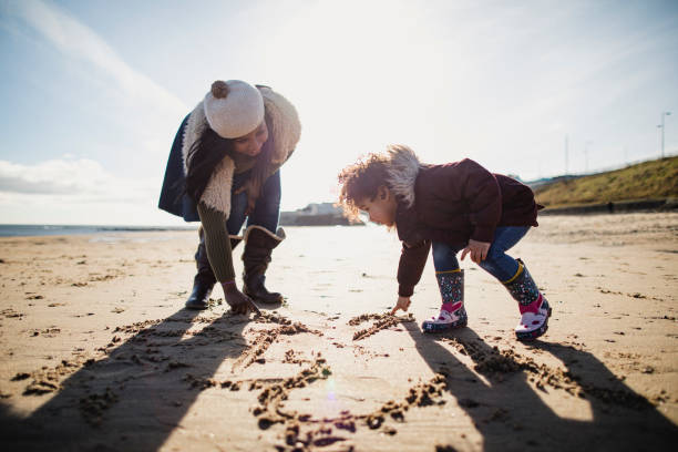 istock Drawing Pictures In The Sand 1134477076