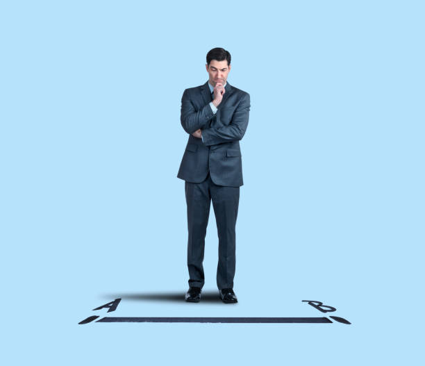 istock Businessman Contemplates The Shortest Distance Between Point A And Point B 1134479127