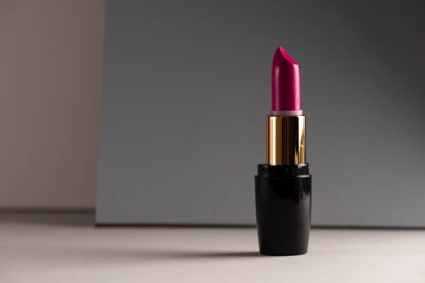 istock Pink lipstick on modern background. Product and make up  concept 1134483497