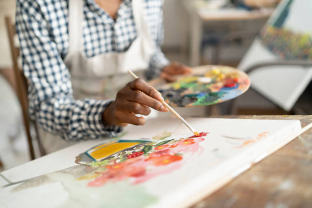 istock Female artist working in studio 1134484961