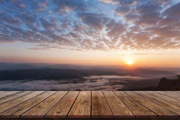 istock wood display shelf on Beautiful sky sunset 1134489945