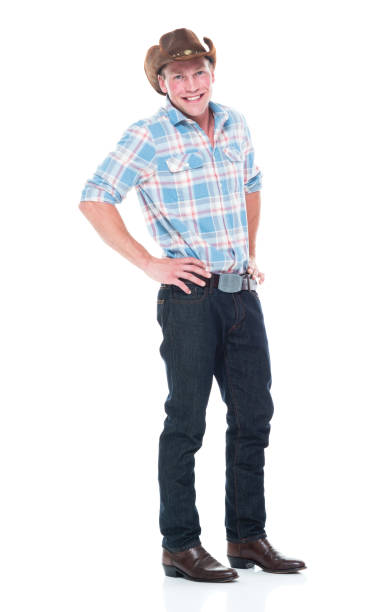 istock Handsome cowboy is standing with hands on hips 1134497933