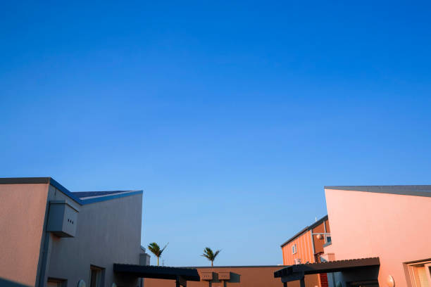 istock Modern and minimal residential building with light and shadow, summer background 1134498547
