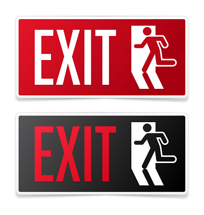 Exit information signs with silhouette running out of a building.