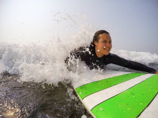 istock Girl learning to Surf 1134502244