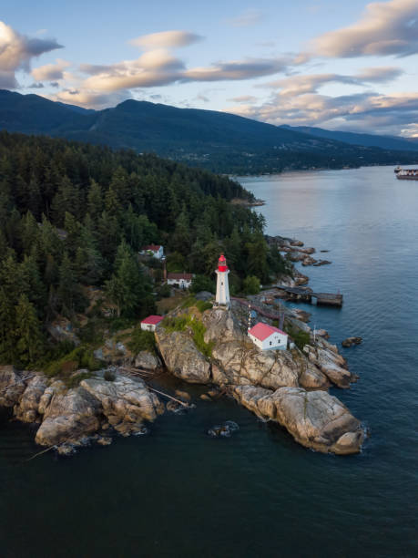Howe Sound Aerial Aerial view of a beautiful Canadian Landscape during a cloudy summer sunset. Taken in Lighthouse Park, Horseshoe Bay, North Vancouver, BC, Canada. west vancouver stock pictures, royalty-free photos & images