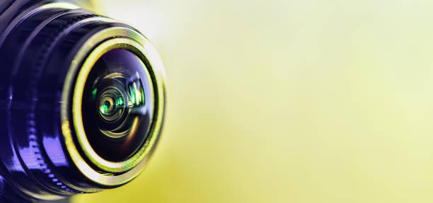 istock Side view of the camera with yellow backlight. Horizontal photography. Banner 1134505598