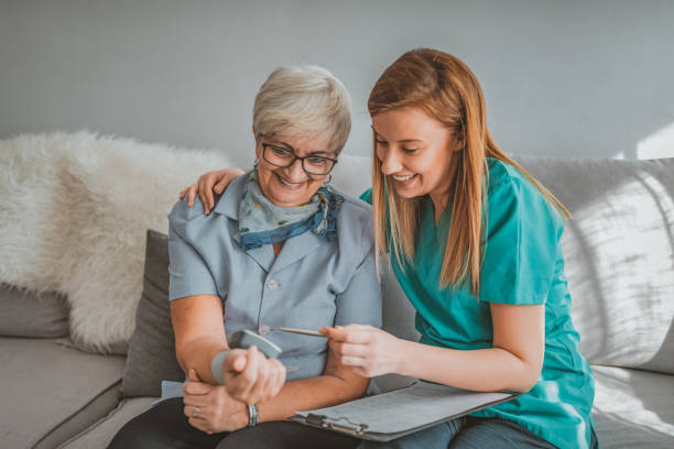 istock Female general practitioner measuring patient pressure 1134506261