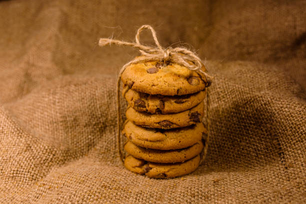 istock Stack of the chocolate chip cookies on sackcloth 1134510215