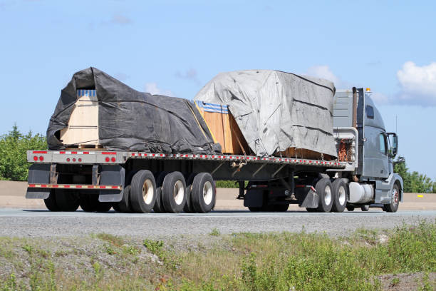 istock Semi Flatbed Truck On Highway 1134510459