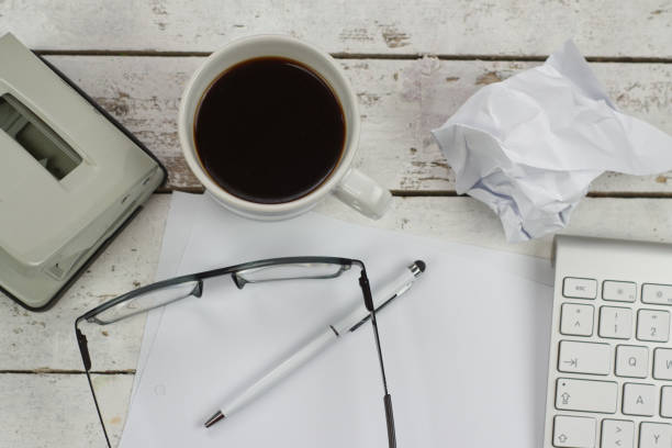 istock Glasses and office utensils on desk 1134514508