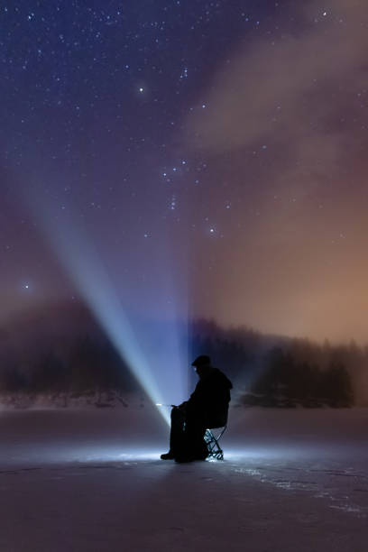 istock Ice fishing under the stars 1134514586