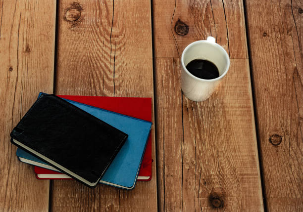 istock pen, notepad and a cup of tea 1134515853
