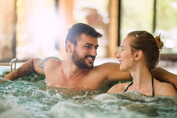 2,400+ Couple In Jacuzzi Stock Photos, Pictures & Royalty-Free Images - iStock | in pool, Outdoor jacuzzi, Young drinking wine