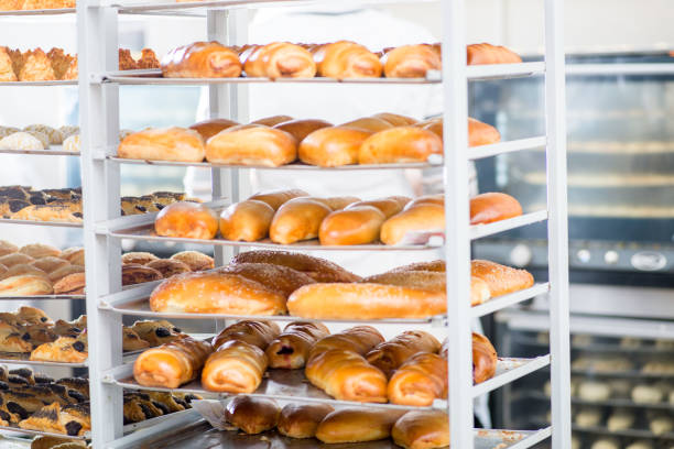 istock racks with finished and raw dough products in a bakery 1134518494