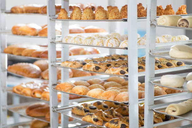 istock racks with finished and raw dough products in a bakery 1134518521